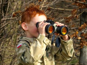 person using binoculars